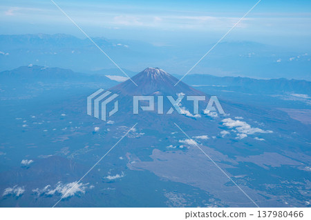 Mount Fuji as seen from the window of an airplane high in the sky Mount Fuji as seen from the window of an airplane high in the sky 137980466