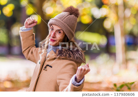 Woman showing strength and overcoming health challenges Woman showing strength and overcoming health challenges 137980606