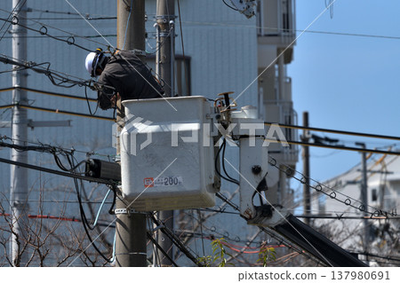 Telecommunications construction work: Scenes from maintenance work on communication cables. Telecommunications construction work: Scenes from maintenance work on communication cables. 137980691