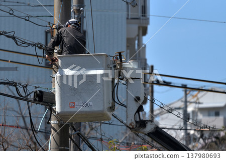 Telecommunications construction work: Scenes from maintenance work on communication cables. Telecommunications construction work: Scenes from maintenance work on communication cables. 137980693