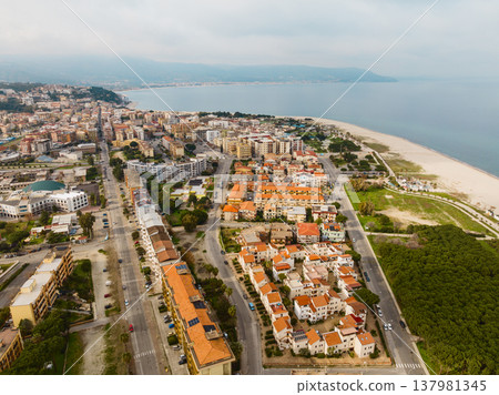 The city of Soverato in Calabria with its waterfront and buildings in summer The city of Soverato in Calabria with its waterfront and buildings in summer 137981345