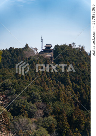 A view overlooking the ruins of Asuke Castle and the surrounding mountain range. A view overlooking the ruins of Asuke Castle and the surrounding mountain range. 137982069