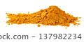 A pile of bright yellow turmeric powder isolated. Ground organic curcuma spice used in cooking and herbal medicine. culinary ingredient and food spice. 137982234
