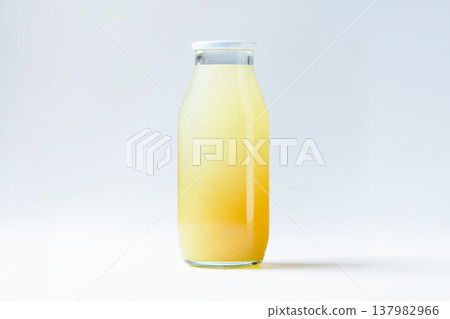 Apple juice souvenir: Plain bottle mockup with white background Apple juice souvenir: Plain bottle mockup with white background 137982966