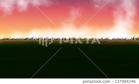 A horizontal landscape with an embankment and a sunset. 137984246