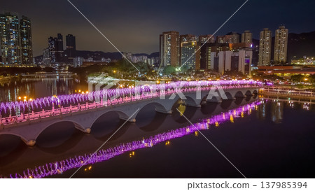 Vibrant Night Lights Illuminate Festive Bridge Over Shing Mun Vibrant Night Lights Illuminate Festive Bridge Over Shing Mun 137985394