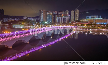Vibrant Night Lights Illuminate Festive Bridge Over Shing Mun 137985412