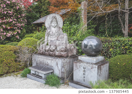 Tranquil Stone Buddhist Statue and Orb in Japanese Garden Nov 28 2025 Tranquil Stone Buddhist Statue and Orb in Japanese Garden Nov 28 2025 137985445