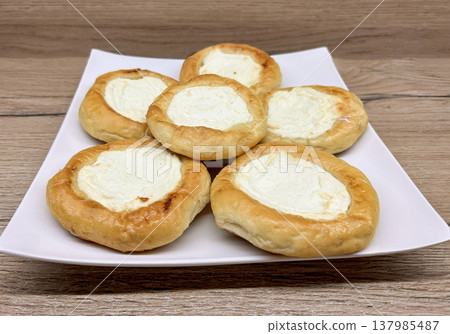 Vatrushki with cottage cheese Vatrushki with cottage cheese 137985487