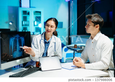 Professional doctor examining patient with stethoscope in modern clinic, healthcare consultation, medical checkup, diagnosis, trust, technology and wellness care. Professional doctor examining patient with stethoscope in modern clinic, healthcare consultation, medical checkup, diagnosis, trust, technology and wellness care. 137986006