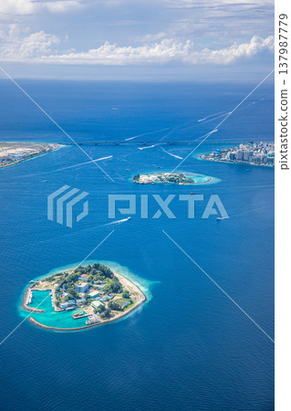 Idyllic Male Maldives aerial landscape, turquoise ocean, boats and harbors, iconic cityscape, tropical paradise, famous travel destination, luxury scenic background 137987779
