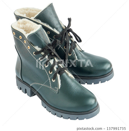 Pair of Green Leather Winter Boots isolated. Shoes cut out Pair of Green Leather Winter Boots isolated. Shoes cut out 137991735