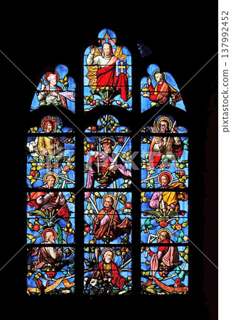 Jesus with apostles, genealogy of Jesus, stained glass window in Church of Saint Leu Saint Gilles in Paris, France Jesus with apostles, genealogy of Jesus, stained glass window in Church of Saint Leu Saint Gilles in Paris, France 137992452