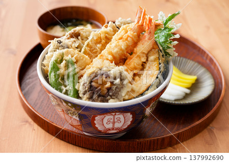 Bowl of rice and fried fish 137992690