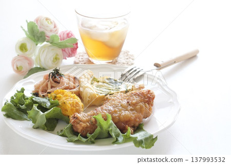 A one-plate meal of fried chicken and quiche. A one-plate meal of fried chicken and quiche. 137993532