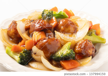 Meatballs in sweet and sour sauce 137994150
