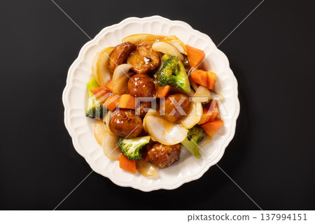 Meatballs in sweet and sour sauce 137994151