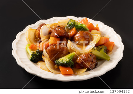 Meatballs in sweet and sour sauce 137994152