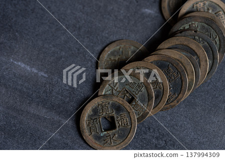 Kan'ei Tsūhō, an old Japanese currency. Kan'ei Tsūhō, an old Japanese currency. 137994309