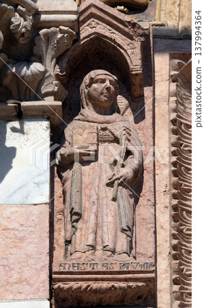 Saint Anastasia, statue on Facade of Sant`Anastasia Church in Verona, Italy 137994364