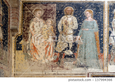 Enthroned Madonna and Child, Saints George, Catherine and a worshipper Knight, fresco in the church of San Pietro Martire in Verona, Italy Enthroned Madonna and Child, Saints George, Catherine and a worshipper Knight, fresco in the church of San Pietro Martire in Verona, Italy 137994366