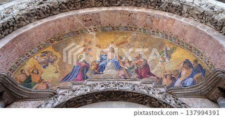 Christ in glory, bezel greater arch, the facade of the Saint Mark basilica, Venice, Italy 137994391