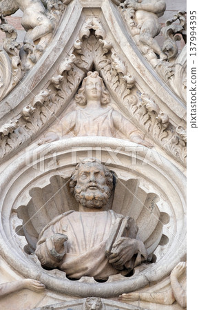 Saint Mark the Evangelist, detail of the Doge Palace, St. Mark Square, Venice, Italy Saint Mark the Evangelist, detail of the Doge Palace, St. Mark Square, Venice, Italy 137994395