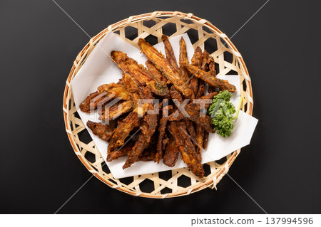 Fried burdock root 137994596