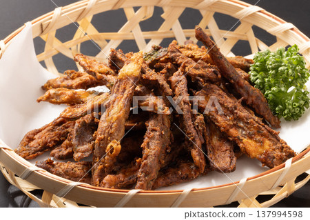 Fried burdock root 137994598