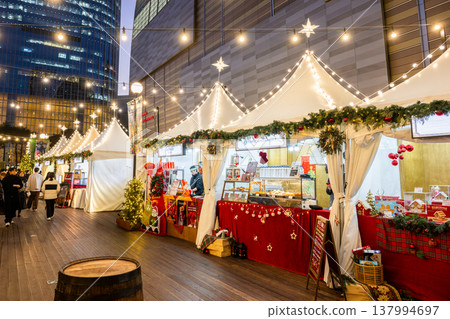 A dazzling night view of the Lotte Town Christmas Market in Seoul, South Korea. A dazzling night view of the Lotte Town Christmas Market in Seoul, South Korea. 137994697