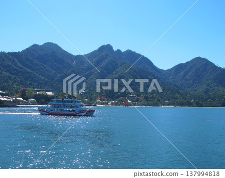 A ship departing from Miyajima Pier, Hiroshima A ship departing from Miyajima Pier, Hiroshima 137994818