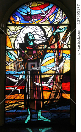 Saint Francis of Assisi, stained glass window in Saint Nicholas church in Cakovec, Croatia Saint Francis of Assisi, stained glass window in Saint Nicholas church in Cakovec, Croatia 137995177