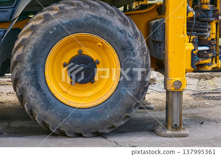 Hydraulic stops of bulldozer,crane,loader on construction Hydraulic stops of bulldozer,crane,loader on construction 137995361
