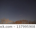 Orion, shooting stars, and satellites floating in the spring sky 137995908
