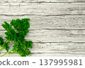 Herbs and black pepper on the table. View from above. Dill, parsley and peppercorns. Recipe for cooking 137995981