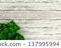 Herbs and black pepper on the table. View from above. Dill, parsley and peppercorns. Recipe for cooking 137995994