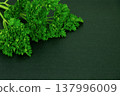 Organic parsley leaves for vegetarian recipe backdrop 137996009