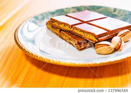 Dubai chocolate is a trendy chocolate. [Image of Dubai chocolate] 137996384