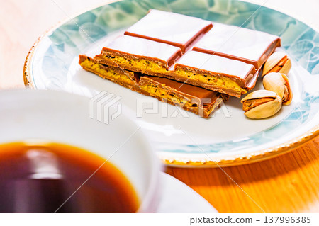 Dubai chocolate is a trendy chocolate. [Image of Dubai chocolate] 137996385