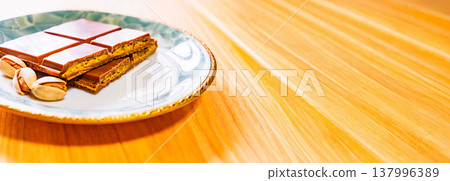 Dubai chocolate is a trendy chocolate. [Image of Dubai chocolate] 137996389