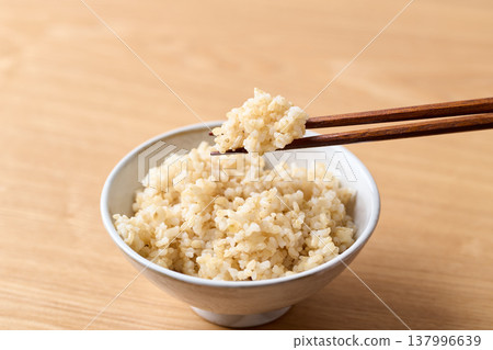 Brown rice served in a bowl Brown rice served in a bowl 137996639