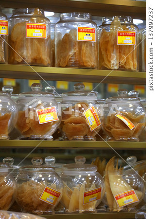 A fish bladder sold at a dried fish store in Des Voeux Road, Hong Kong. Very expensive and expensive Chinese food called "fish gall bladder" A fish bladder sold at a dried fish store in Des Voeux Road, Hong Kong. Very expensive and expensive Chinese food called "fish gall bladder" 137997237