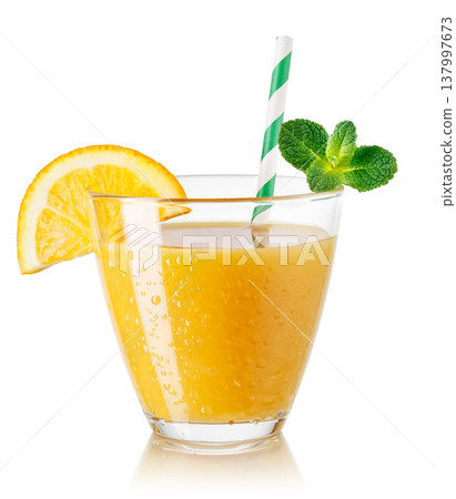 Glass of fresh orange juice with slice and sprig of mint isolated on white background 137997673