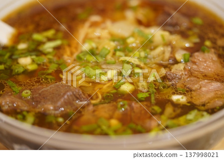 Taiwanese Beef Noodle Soup Bowl with Greens Closeup Taiwanese Beef Noodle Soup Bowl with Greens Closeup 137998021