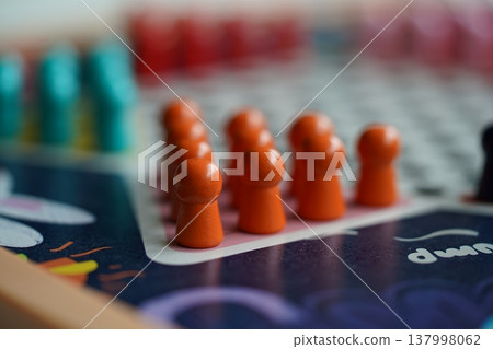 Colorful Board Game Pieces Fun and Entertainment 137998062