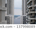 Apartment Buildings Overlooking a River View 137998089