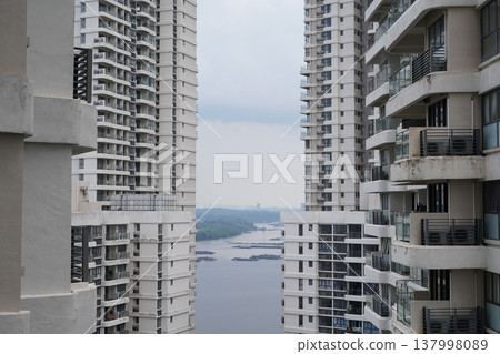 Apartment Buildings Overlooking a River View Apartment Buildings Overlooking a River View 137998089