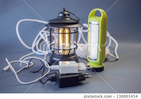 Portable solutions for power and lighting in emergency situations: lanterns, flashlights, power banks and external batteries Portable solutions for power and lighting in emergency situations: lanterns, flashlights, power banks and external batteries 138001454