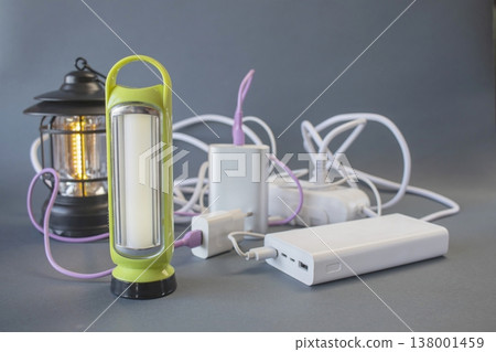 Portable solutions for power and lighting in emergency situations: lanterns, flashlights, power banks and external batteries Portable solutions for power and lighting in emergency situations: lanterns, flashlights, power banks and external batteries 138001459