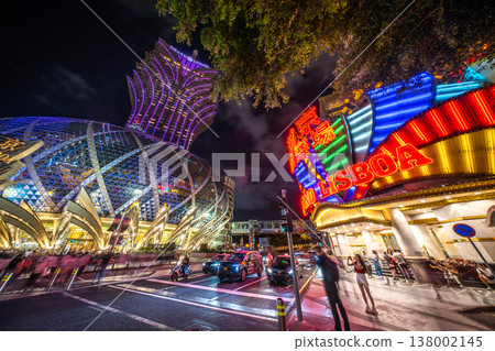 The dazzling night view of Casino Lisboa and Grand Lisboa in Macau. The dazzling night view of Casino Lisboa and Grand Lisboa in Macau. 138002145